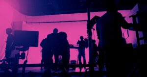 Video Production Insights by Doleep Studios 39 | video production costs A team of professionals brainstorming ideas for a successful corporate video production process