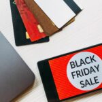 A phone displaying a video with a Black Friday Sale Ad promoting "Mobile Video Ads: Capture the Dubai Market with Doleep Studios.