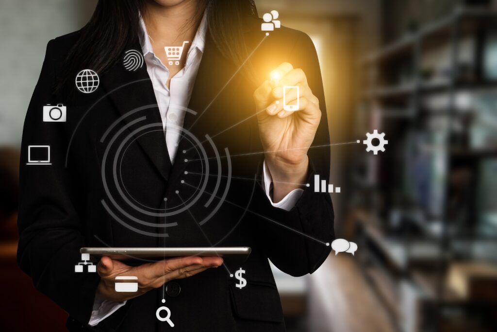 Digital Marketing Video Ads - Woman's hand pointing to digital communication icons
