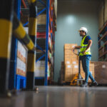 A safety worker in uniform standing confidently, emphasizing the importance of safety videos in the UAE workplace.