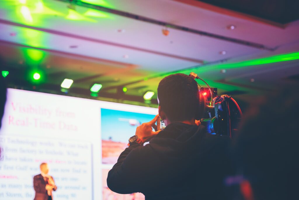 Videographer capturing a live event for Live Streaming Events