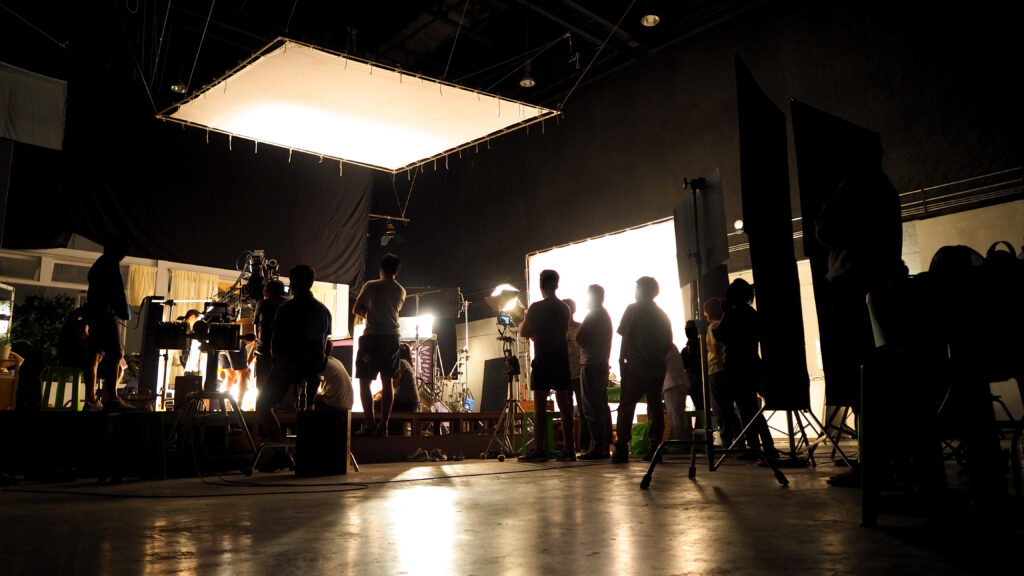 Film production crew on set, capturing the essence of storytelling excellence in Abu Dhabi by Doleep Studios.